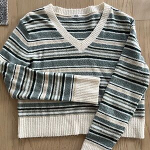 Striped V-Neck Women’s Sweater in Cream and Teal, cropped.